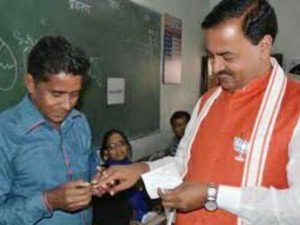 lotus on the jacket of Keshav Maurya at the time of voting