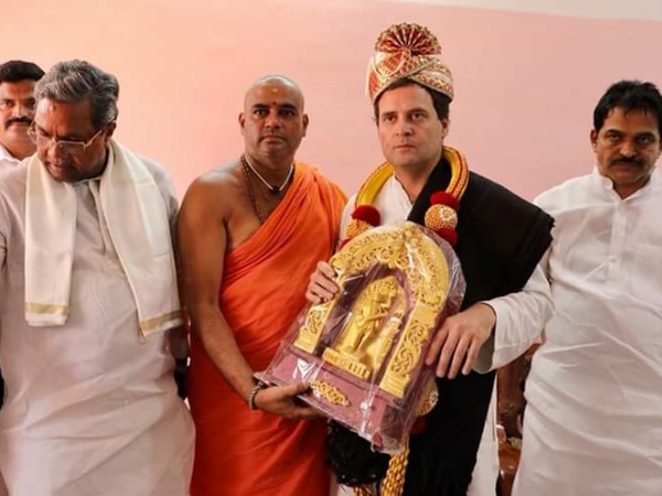 rahul gandhi taken blessings from Niranjanand Puri